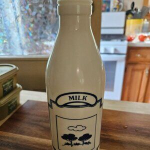 vintage egizia milk glass milk bottle signed on bottom